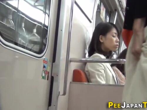Shy Japanese beauty has a pee surprise for voyeur