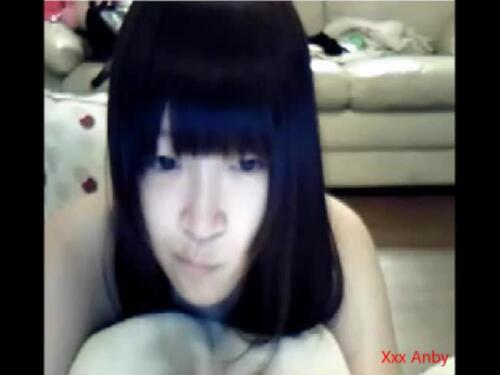 Maki playing with her big tits and her pussy
